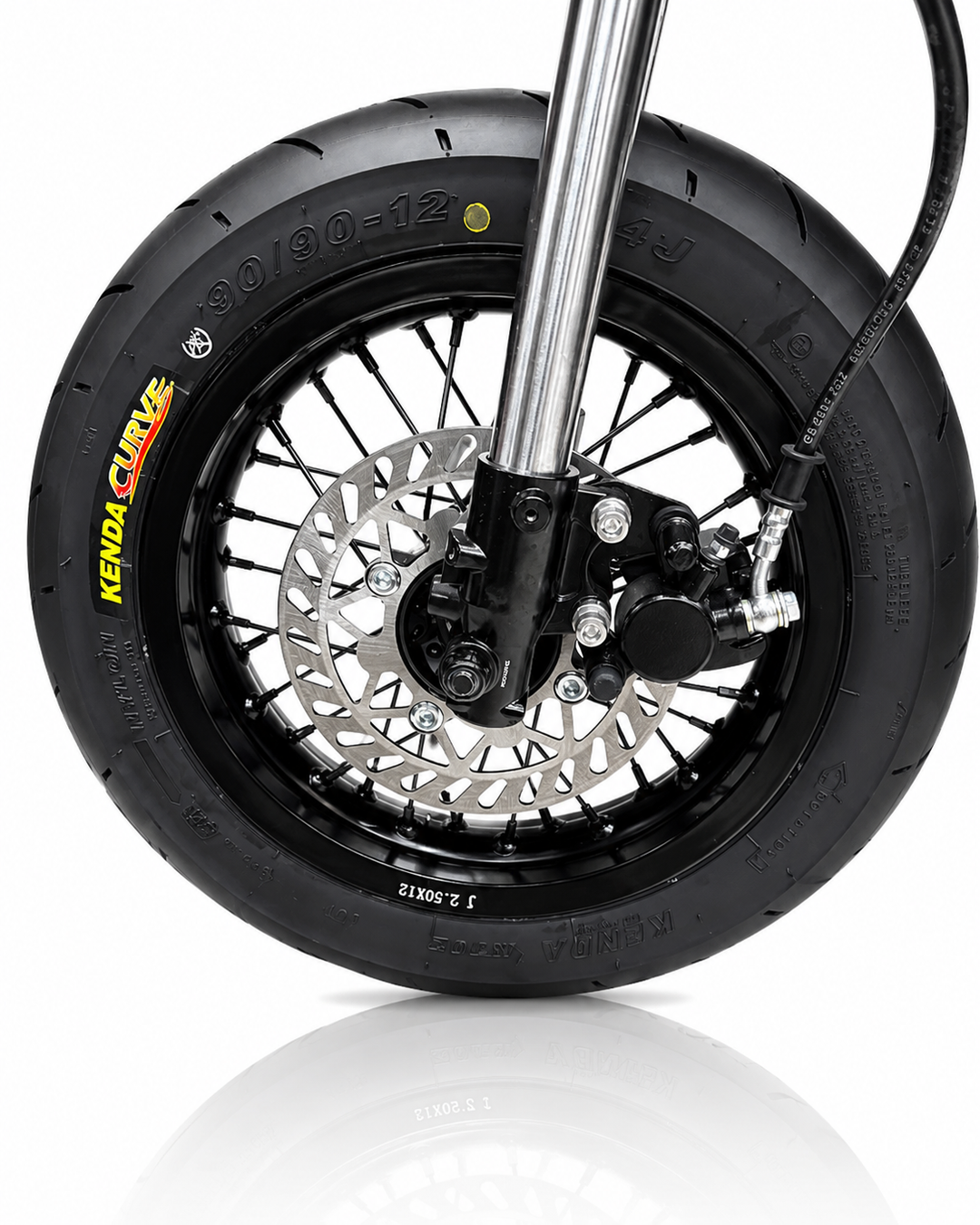 Motorcycle wheel with Kenda tire on a white background