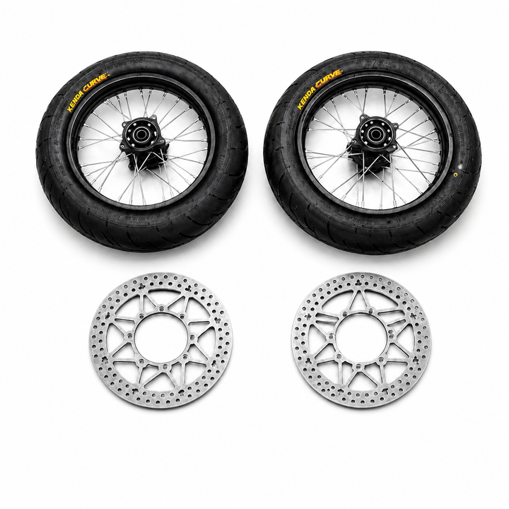 Two motorcycle wheels with tires and two brake rotors on a white background