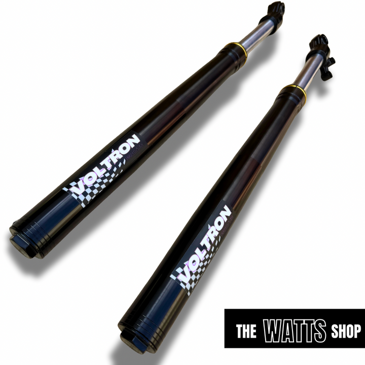 Two Tuttio Soleil 01 shock absorbers with 'Voltron' branding on a white background, featuring 'The Watts Shop' logo.