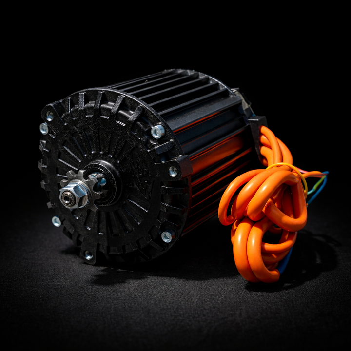 Black electric motor with orange cables on a black background