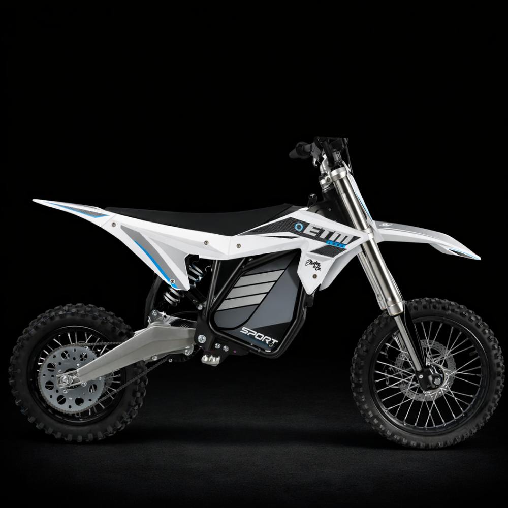 White electric dirt bike with black accents on a black background