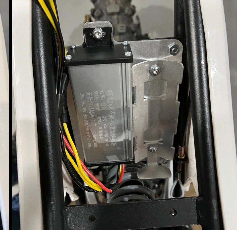 Close-up of electronic components with wires inside a device