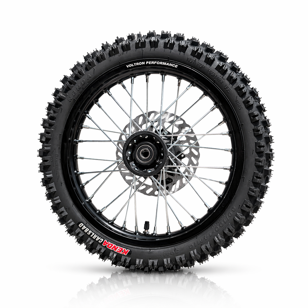 Motorcycle wheel with knobby tire on a white background