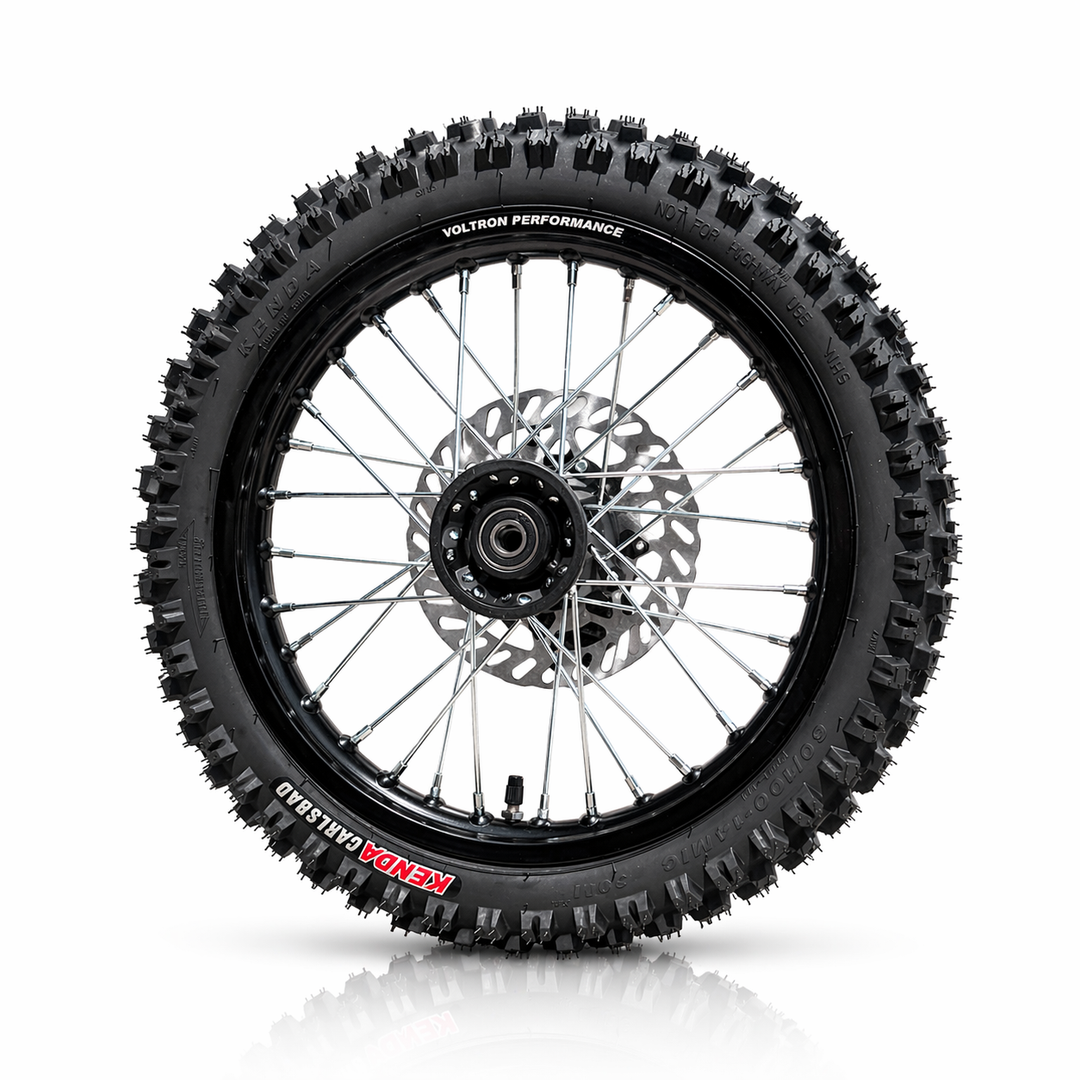 Motorcycle wheel with knobby tire on a white background