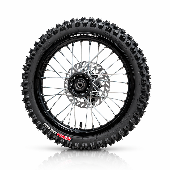 Motorcycle wheel with knobby tire on a white background