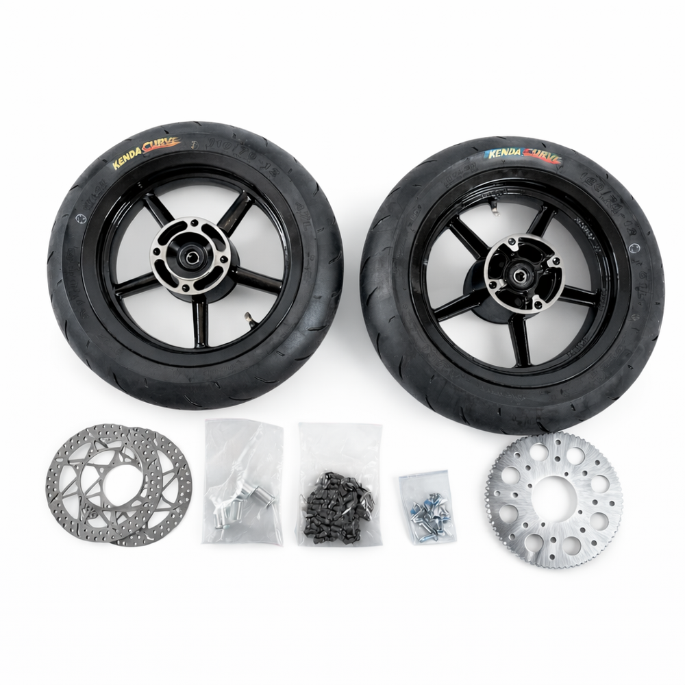 Two scooter wheels with additional parts on a white background