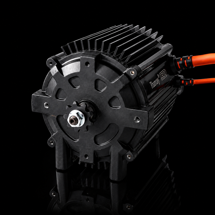 Black electric motor with red connectors on a black background