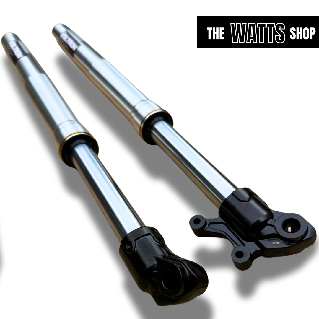 Two Tuttio Soleil shock absorbers with black ends on a white background, branded 'The Watts Shop'.