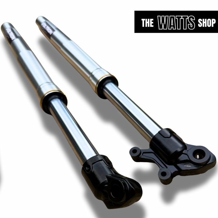 Two Tuttio Soleil shock absorbers with black ends on a white background, branded 'The Watts Shop'.
