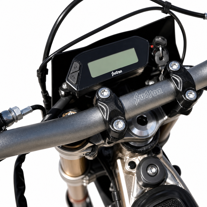 Close-up of a motorcycle handlebar with digital display and 'Sutton' branding.