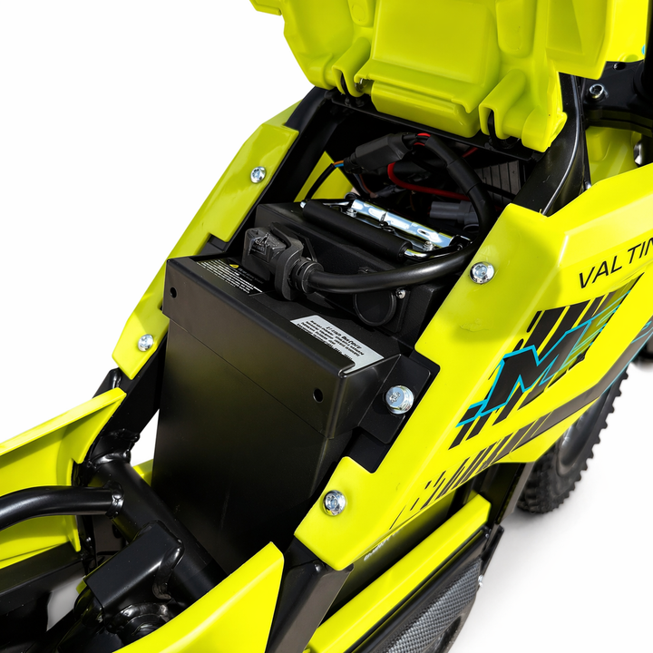 Close-up of a yellow ATV with visible branding on a white background