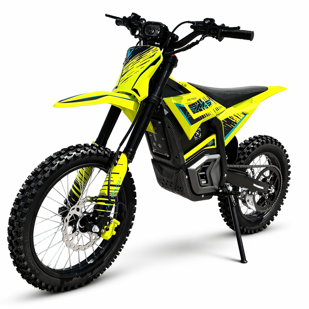 Yellow and black electric dirt bike on a white background