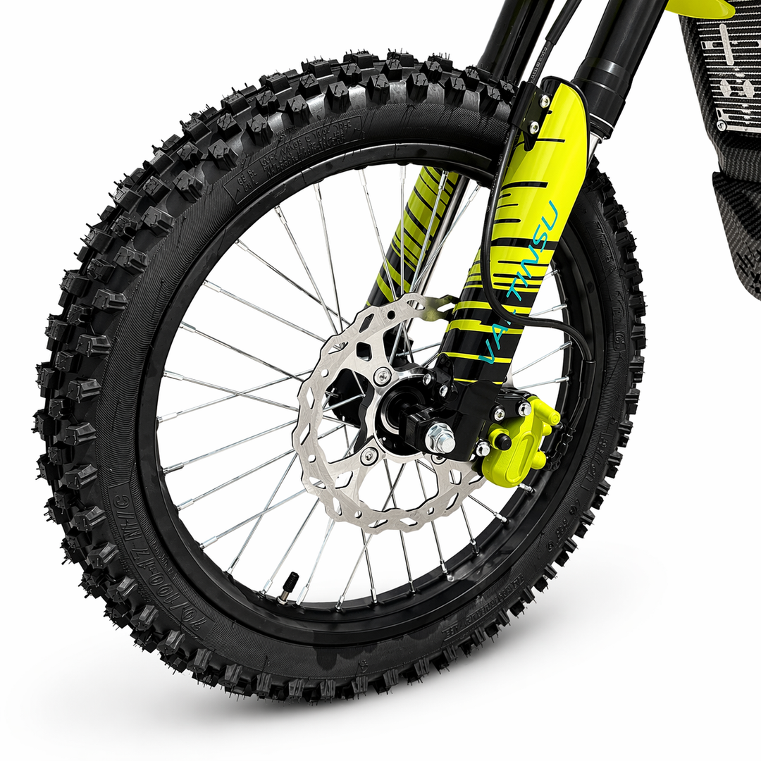 Close-up of a bicycle wheel with knobby tire on a white background