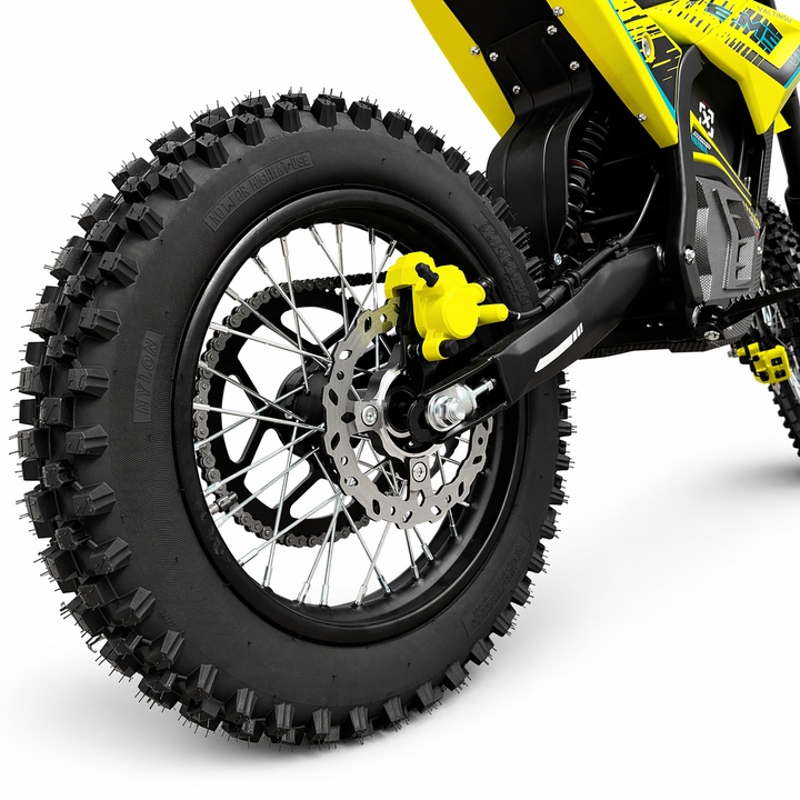 Close-up of a dirt bike wheel with knobby tire on a white background