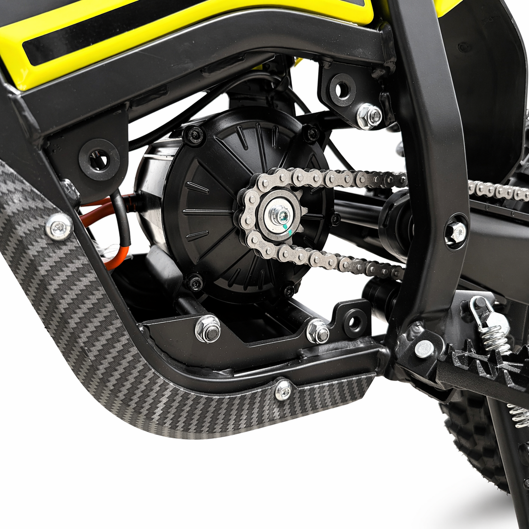 Close-up of a motorcycle chain and sprocket system on a white background