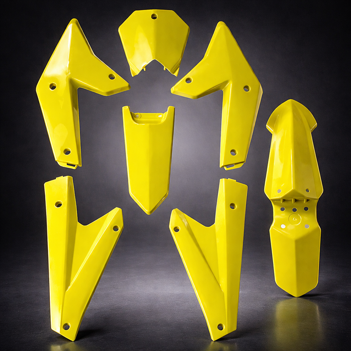 Yellow protective motorcycle guards on a dark background