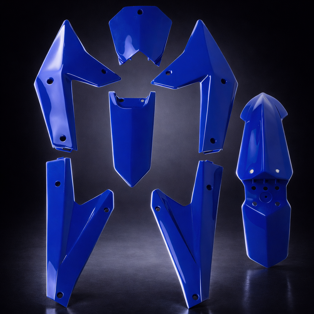Set of blue motorcycle plastic guards on a black background