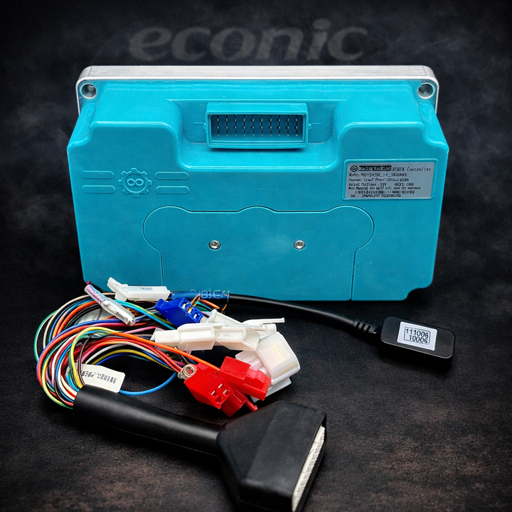 Blue electronic device with wiring harness on a dark background