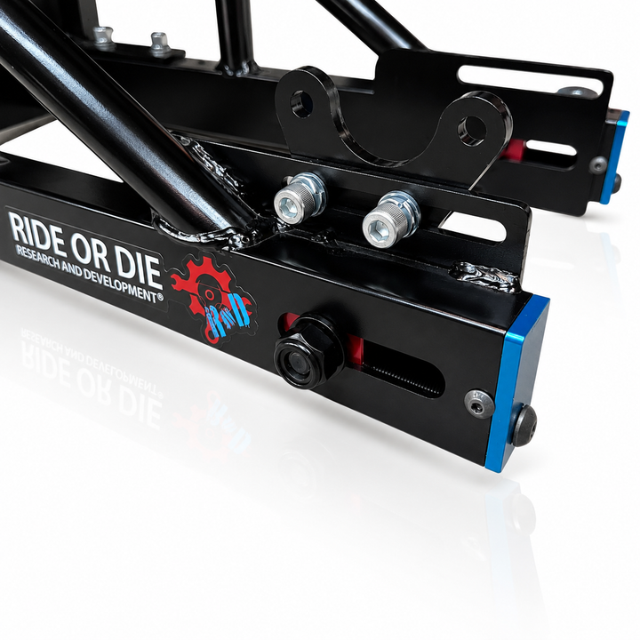 Close-up of a mechanical component with 'Ride or Die Research and Development' branding on a white background.
