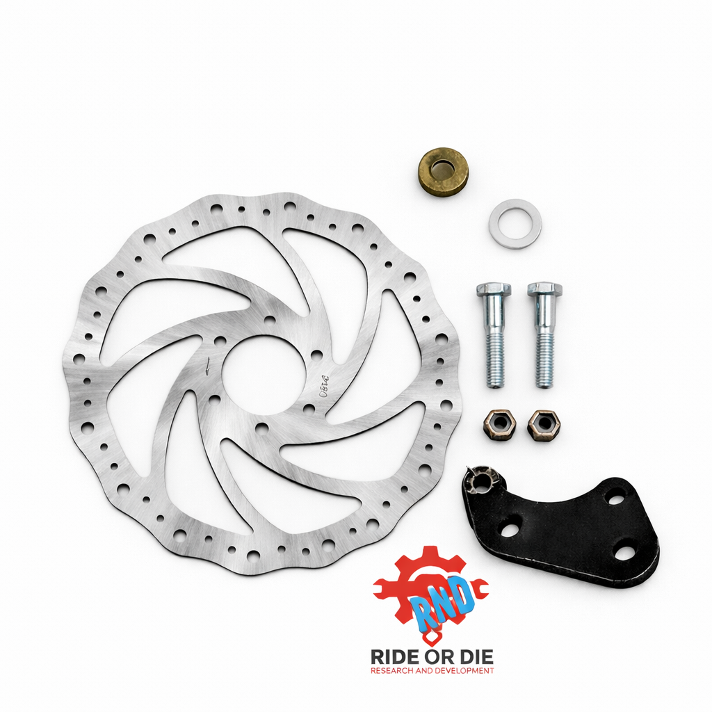 Bicycle disc brake rotor with hardware on a white background, featuring 'Ride or Die' logo.