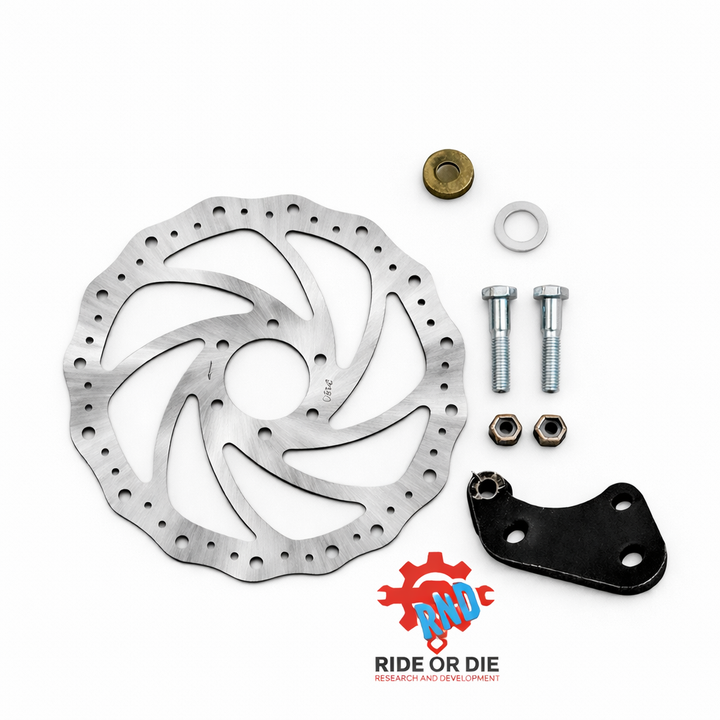 Bicycle disc brake rotor with hardware on a white background, featuring 'Ride or Die' logo.