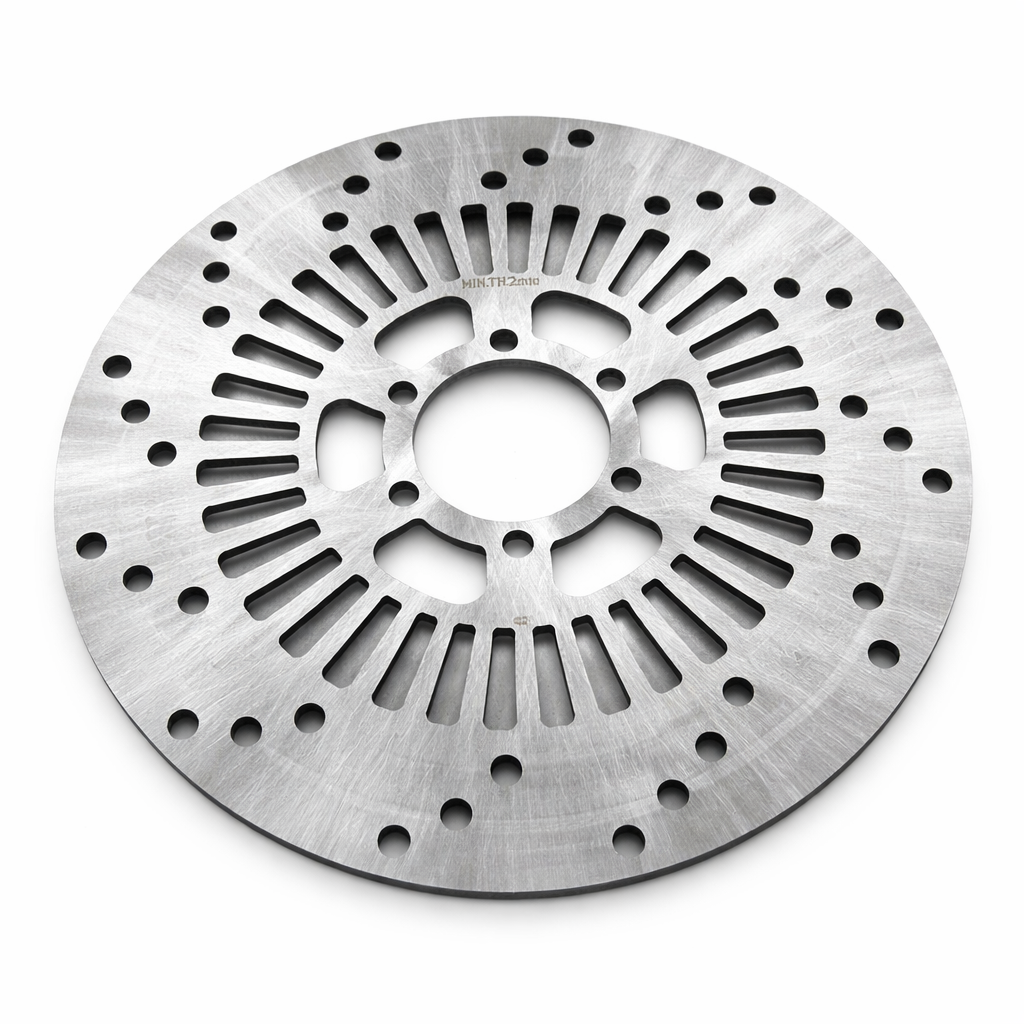 Metallic disc with a central hole and slotted design on a white background