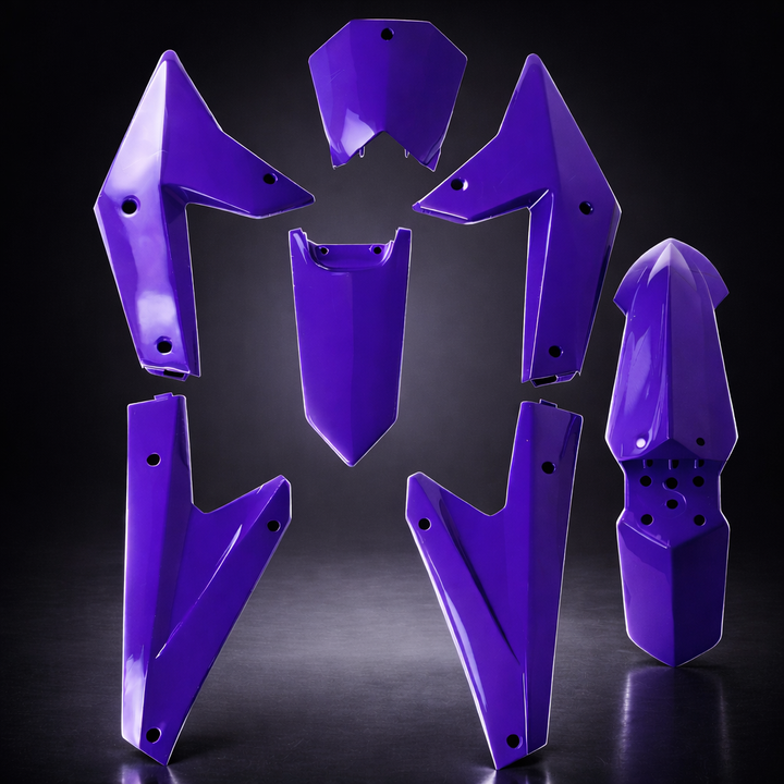 Set of purple motorcycle fenders on a black background