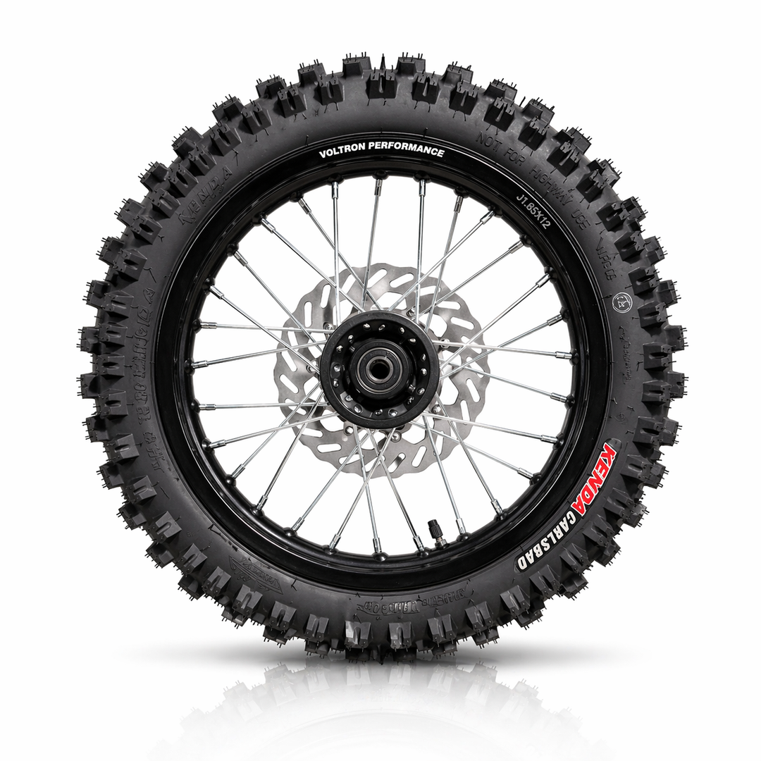 Motorcycle wheel with knobby tire on a white background