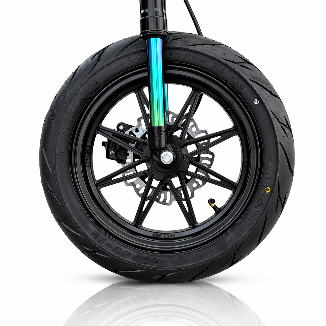 Close-up of a motorcycle wheel with a white background