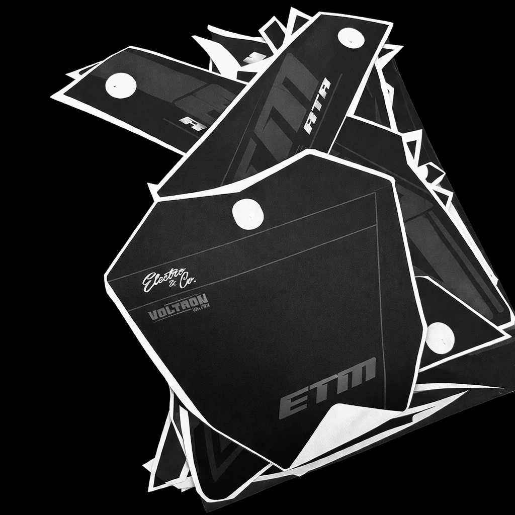 Black and white graphic of a geometric design with 'ETM' branding on a black background